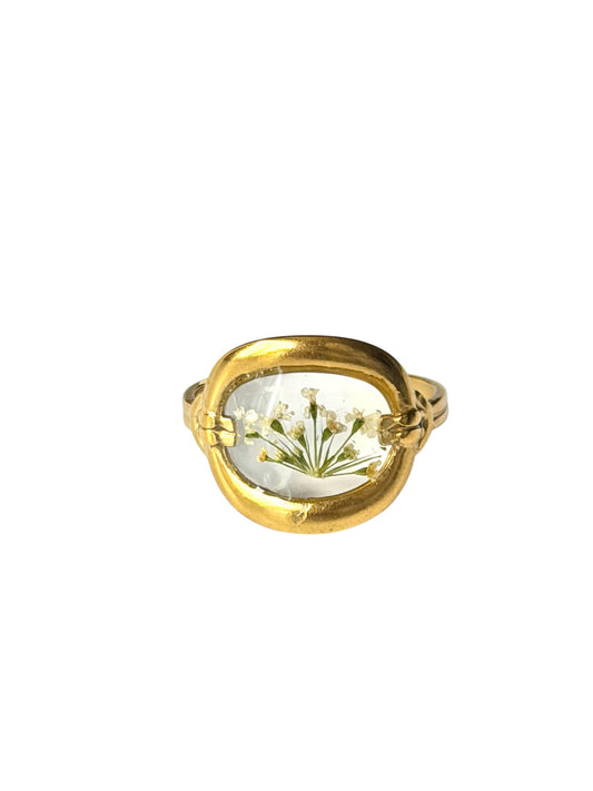 Anillo flores blancas inscrustadas